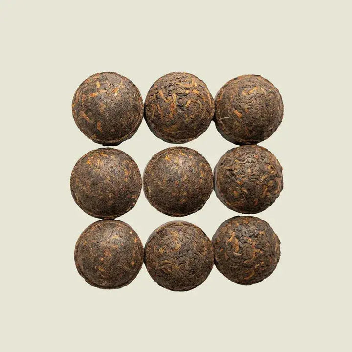 Pu Erh Mini Tuo Cha - Noema - Loser gepresster Tee von oben fotografiert