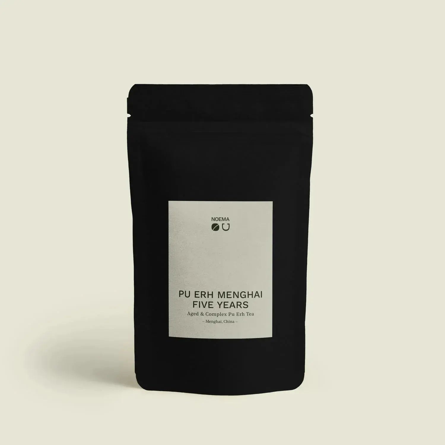 Pu Erh Menghai 5 Years - Noema - Teeverpackung von oben fotograviert